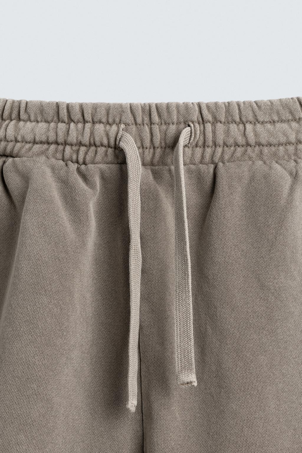 ШОРТЫ-ДЖОГГЕРЫ ИЗ ТКАНИ С ЭФФЕКТОМ ПОТЕРТОСТИ