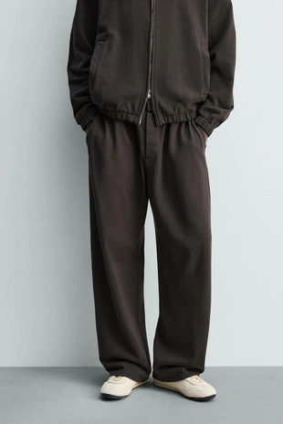 Джоггеры из трикотажа с эффектом потертости- Заказать в России