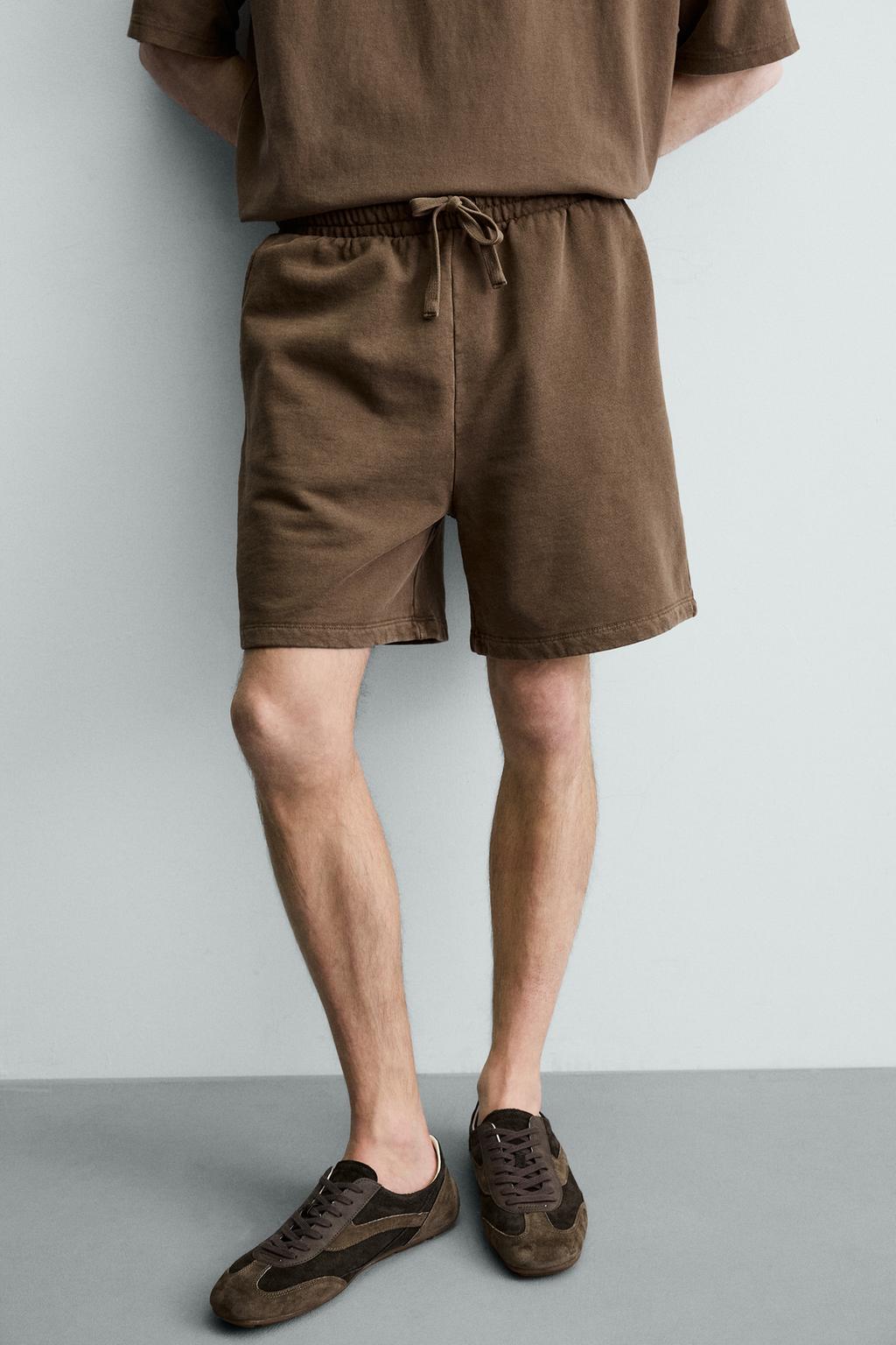 ШОРТЫ-ДЖОГГЕРЫ ИЗ ТКАНИ С ЭФФЕКТОМ ПОТЕРТОСТИ