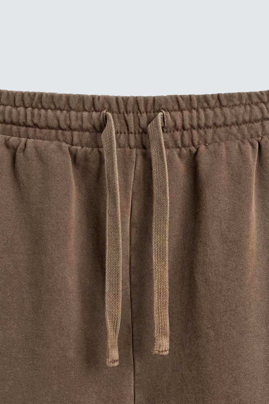 ШОРТЫ-ДЖОГГЕРЫ ИЗ ТКАНИ С ЭФФЕКТОМ ПОТЕРТОСТИ