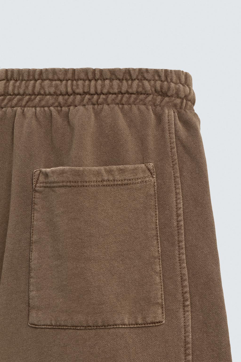 ШОРТЫ-ДЖОГГЕРЫ ИЗ ТКАНИ С ЭФФЕКТОМ ПОТЕРТОСТИ