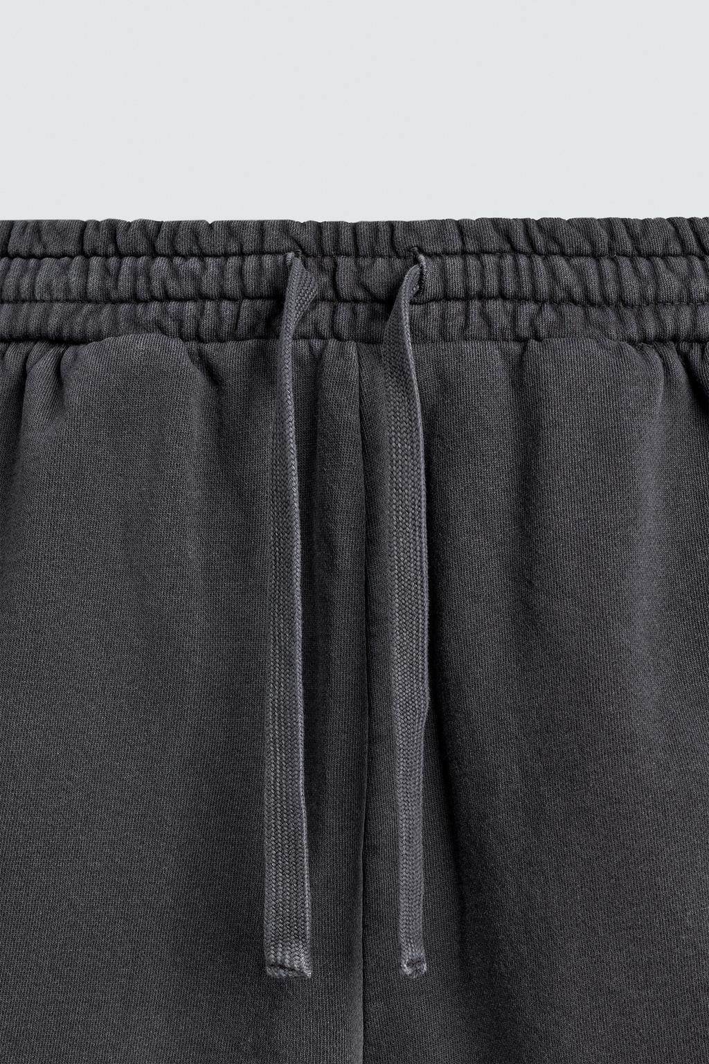 ШОРТЫ-ДЖОГГЕРЫ ИЗ ТКАНИ С ЭФФЕКТОМ ПОТЕРТОСТИ