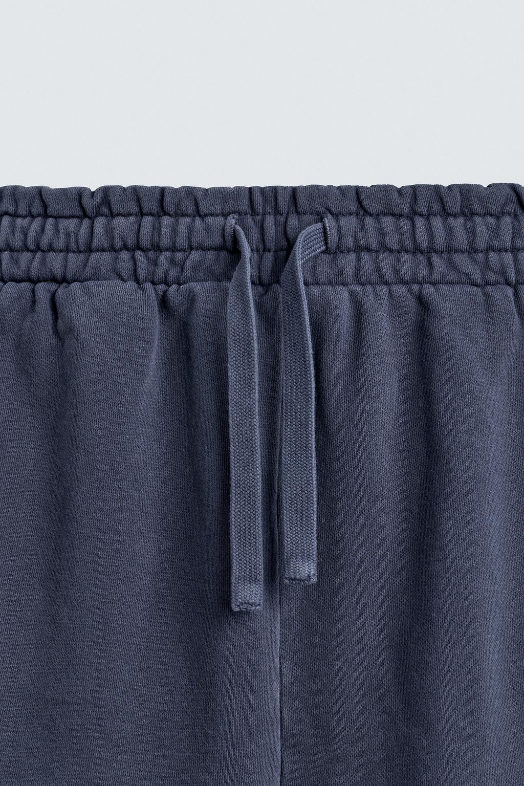 ШОРТЫ-ДЖОГГЕРЫ ИЗ ТКАНИ С ЭФФЕКТОМ ПОТЕРТОСТИ