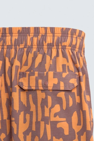 Длинные плавки с абстрактным принтом- Заказать в России