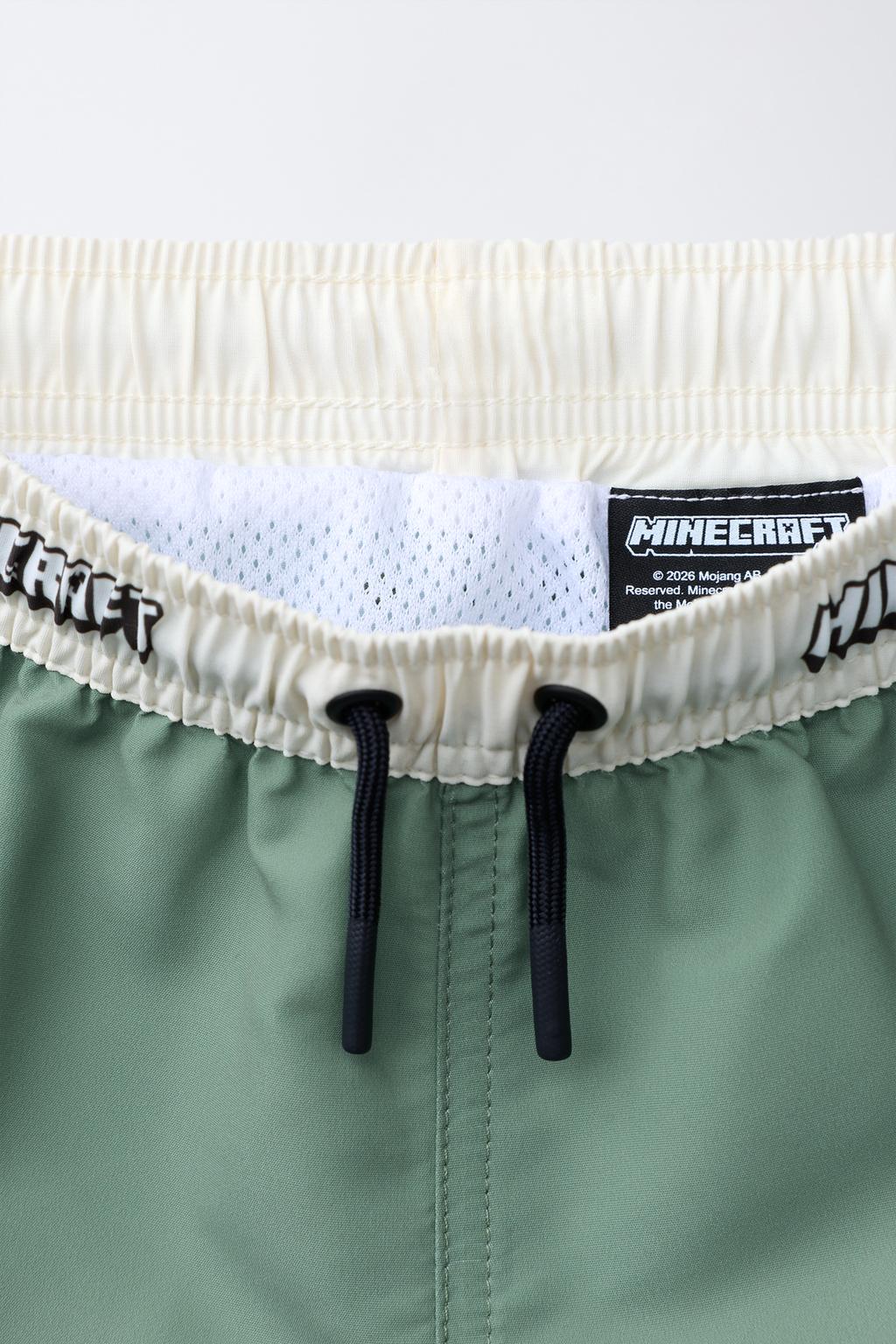 6-14 ЛЕТ/ПЛАВКИ-БЕРМУДЫ С ПРИНТОМ MINECRAFT ©MOJANG AB. ™