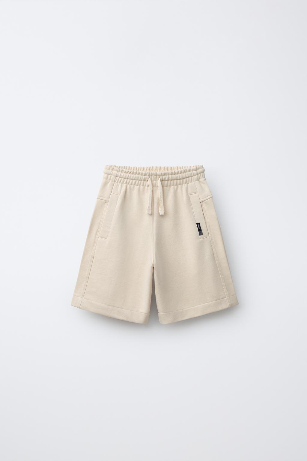 ШОРТЫ ИЗ МЯГКОЙ ТКАНИ С ЭТИКЕТКОЙ