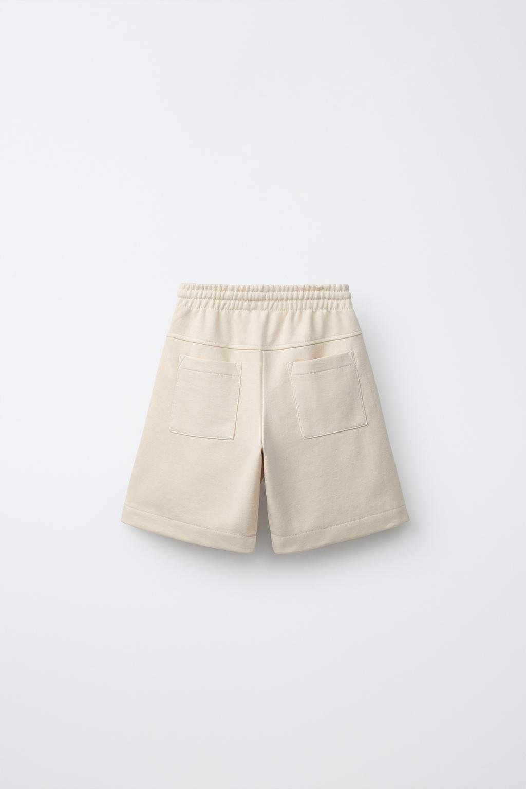 ШОРТЫ ИЗ МЯГКОЙ ТКАНИ С ЭТИКЕТКОЙ