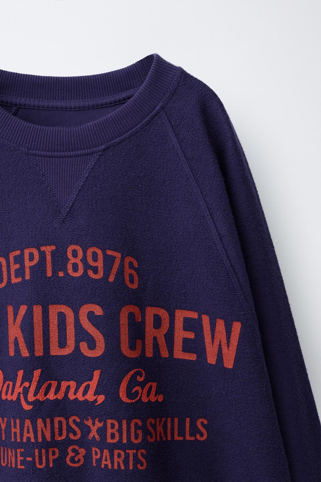 Пуловер с надписью