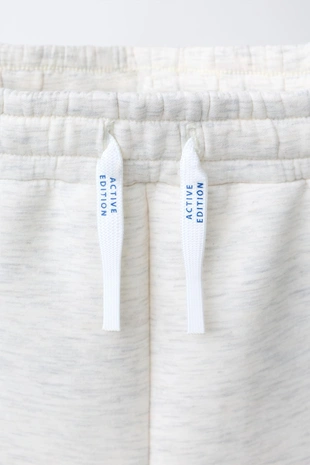 Спортивные шорты-бермуды с логотипом- Заказать в России