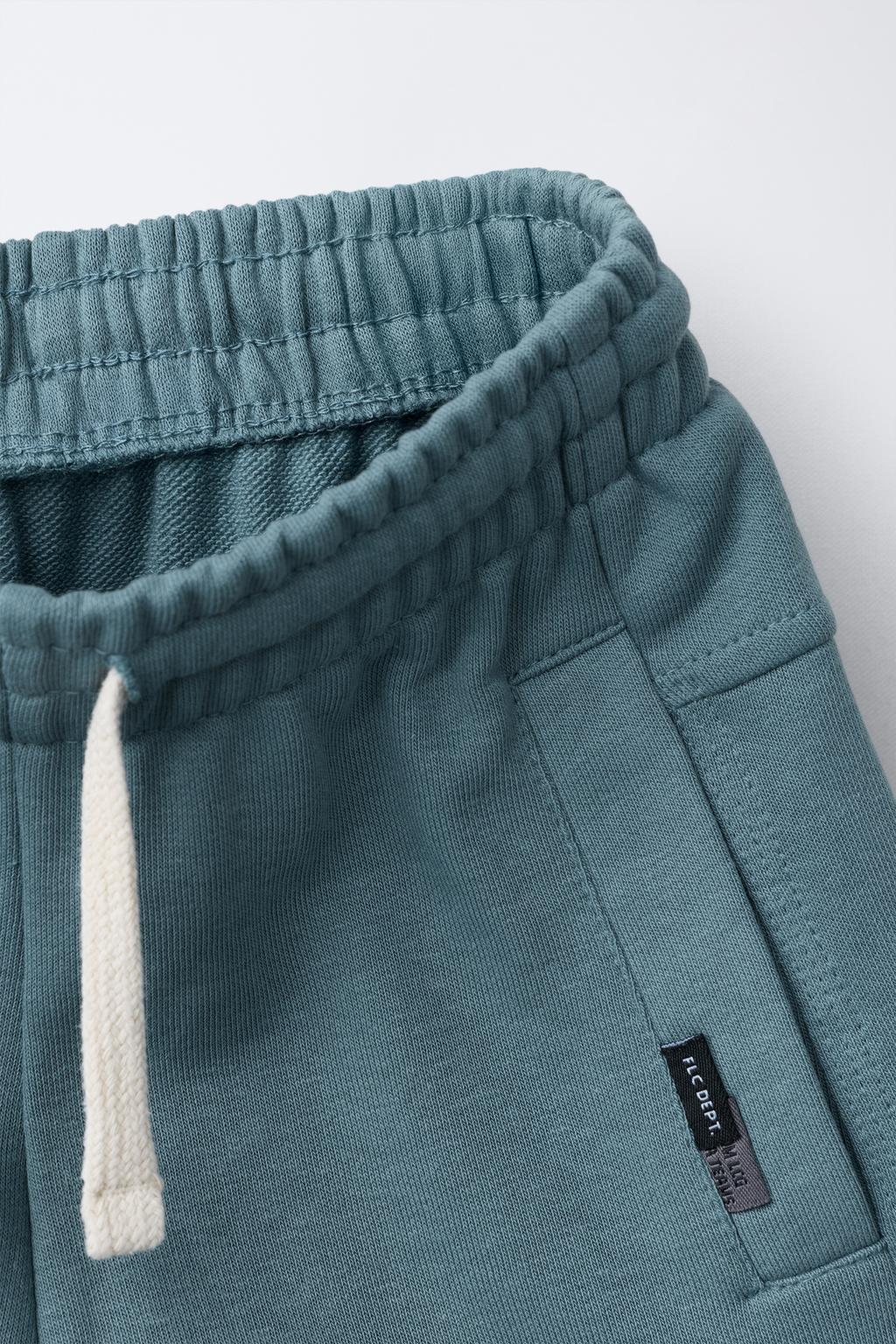 ШОРТЫ ИЗ МЯГКОЙ ТКАНИ С ЭТИКЕТКОЙ