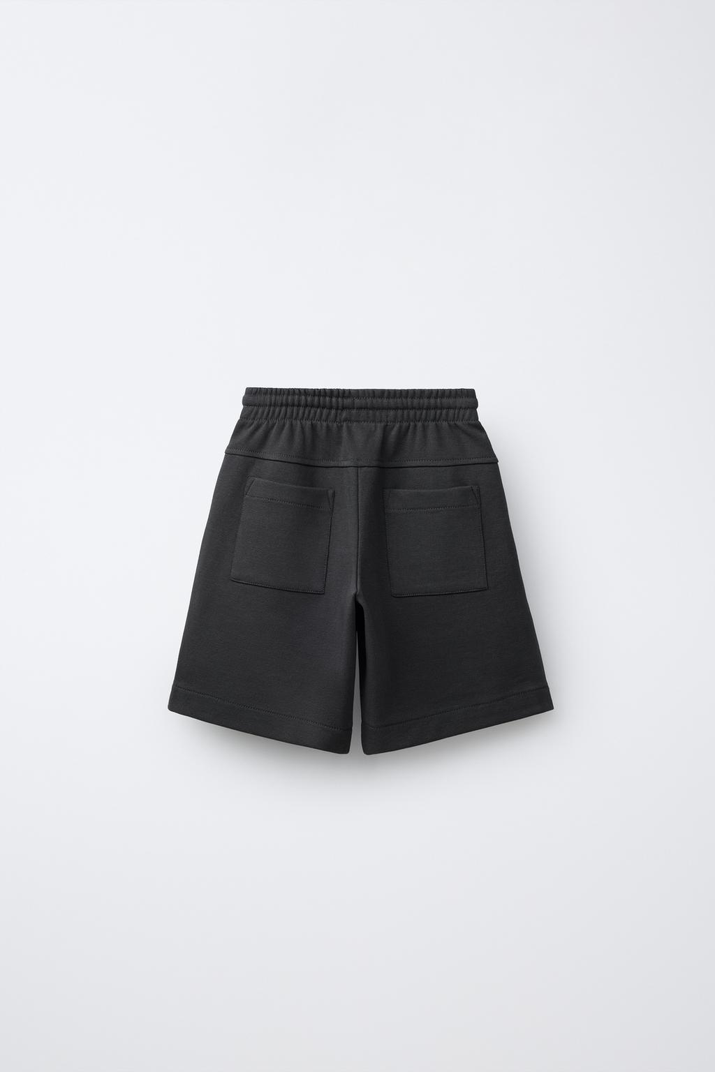 ШОРТЫ ИЗ МЯГКОЙ ТКАНИ С ЭТИКЕТКОЙ