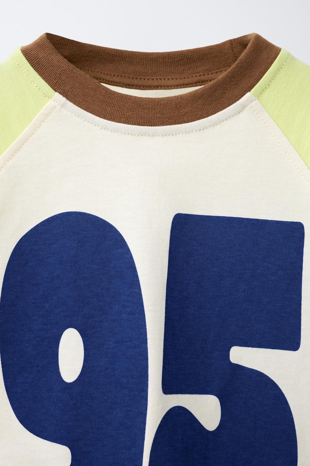 МАЙКА РУКАВА РЕГЛАН С ЦИФРОЙ