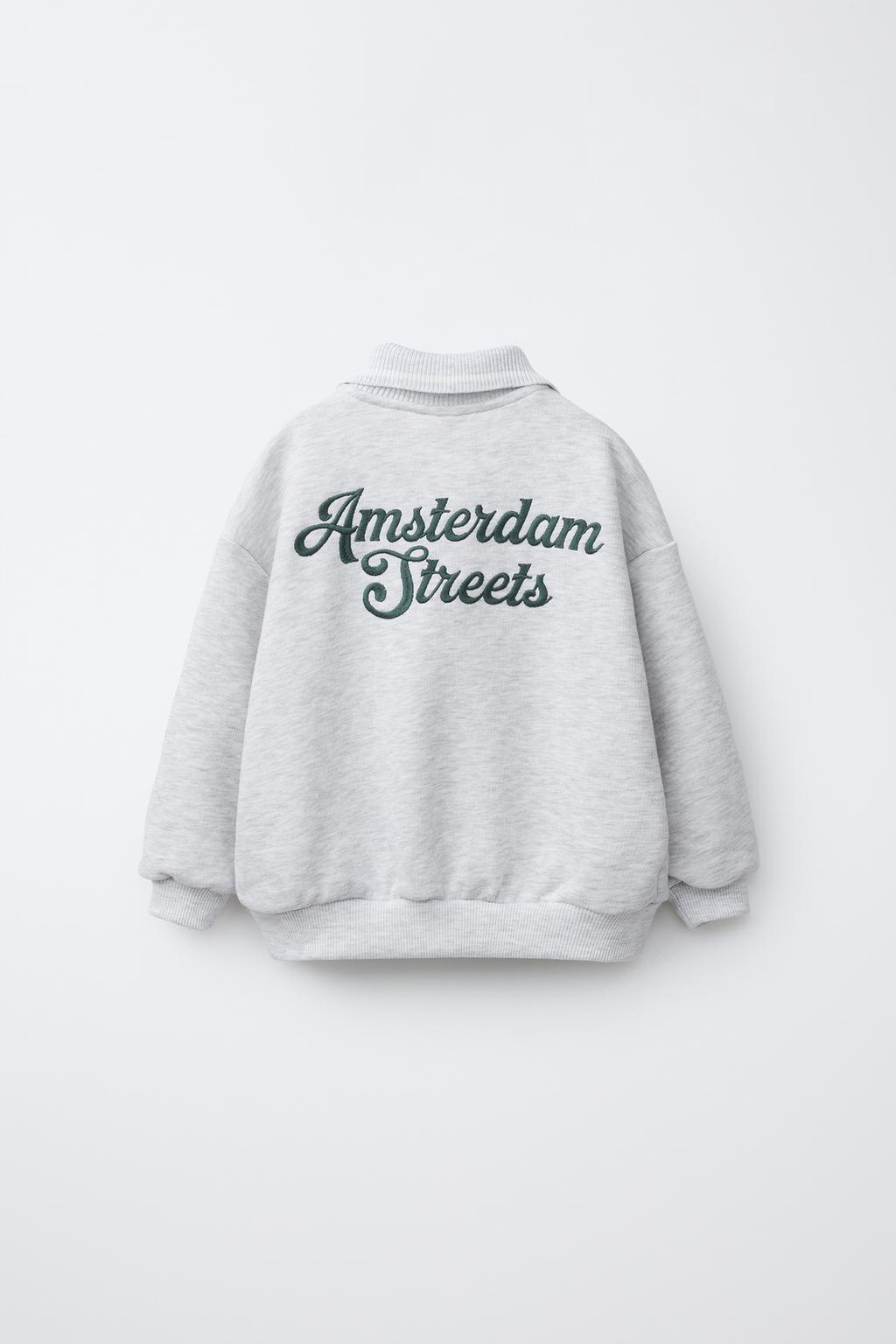 ТОЛСТОВКА ПОЛО С ВЫШИТОЙ НАШИВКОЙ