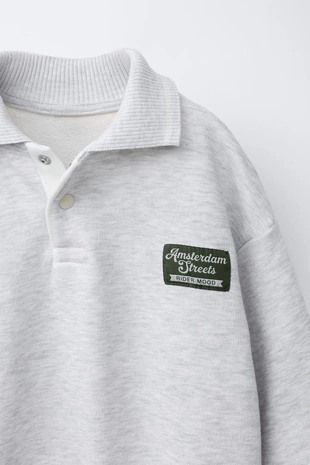 Толстовка поло с вышитой нашивкой- Заказать в России