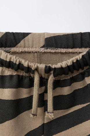 Шорты с анималистичным принтом- Заказать в России