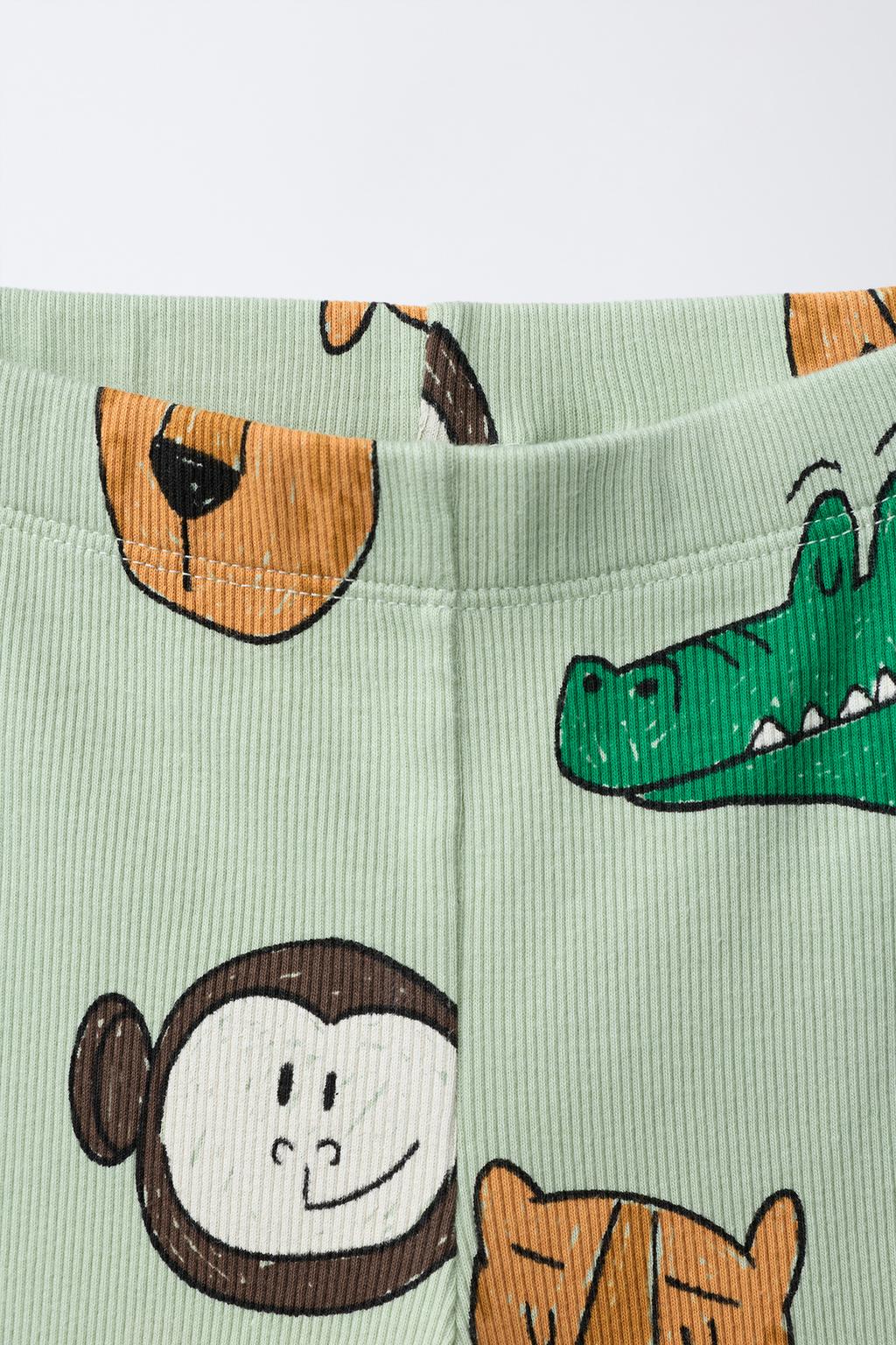 ЛЕГИНСЫ В РУБЧИК С АНИМАЛИСТИЧНЫМ ПРИНТОМ