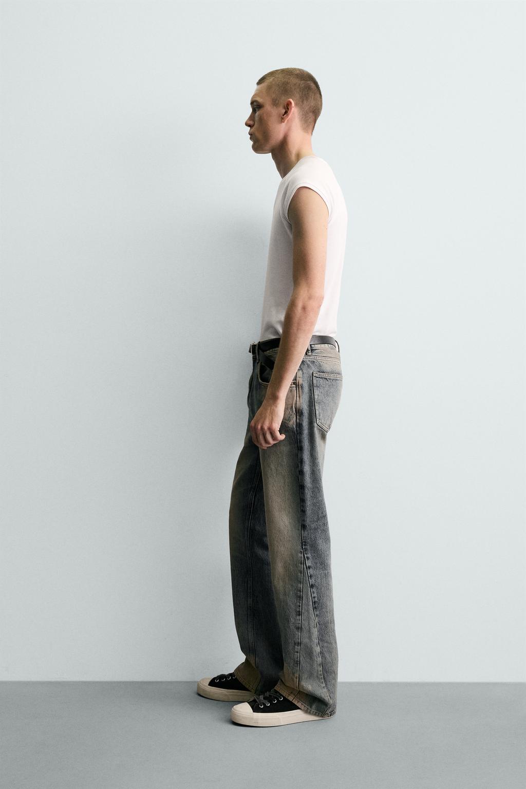 ДЖИНСЫ FLARE FIT С ЭФФЕКТОМ ПЯТЕН