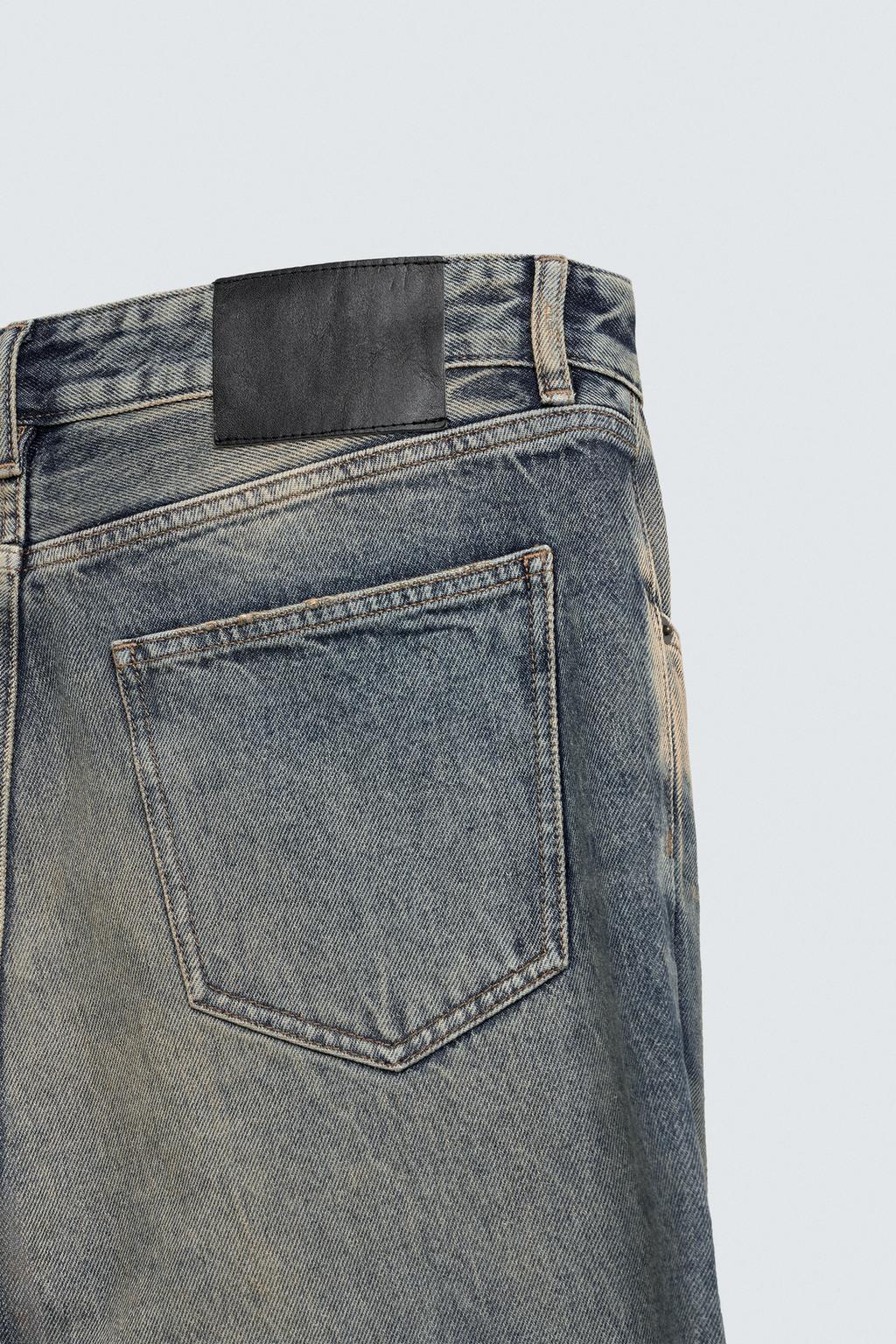 ДЖИНСЫ FLARE FIT С ЭФФЕКТОМ ПЯТЕН