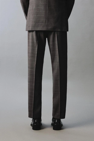 Костюмные брюки в клетку из 100% шерсти- Заказать в России