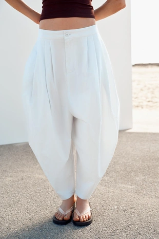 Объемные брюки со складками- Заказать в России