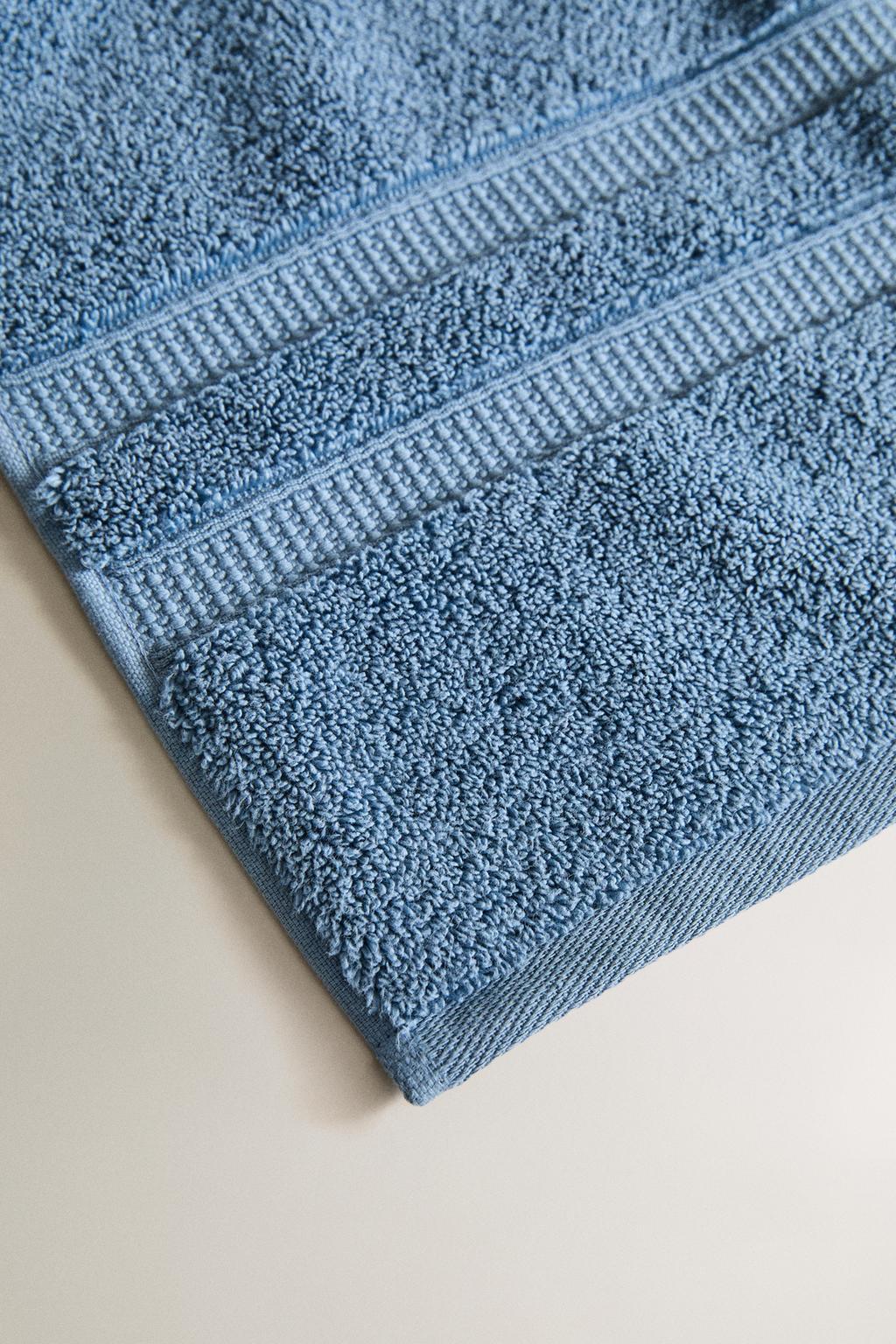 Мягкое велюровое полотенце с двойной отделкой