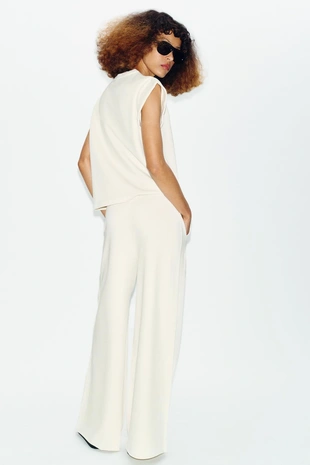 Широкие брюки из мягкой ткани- Заказать в России