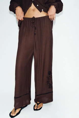 Широкие брюки с вышивкой и кружевными вставками- Заказать в России