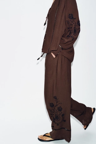 Широкие брюки с вышивкой и кружевными вставками- Заказать в России