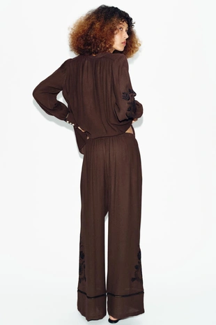 Широкие брюки с вышивкой и кружевными вставками- Заказать в России