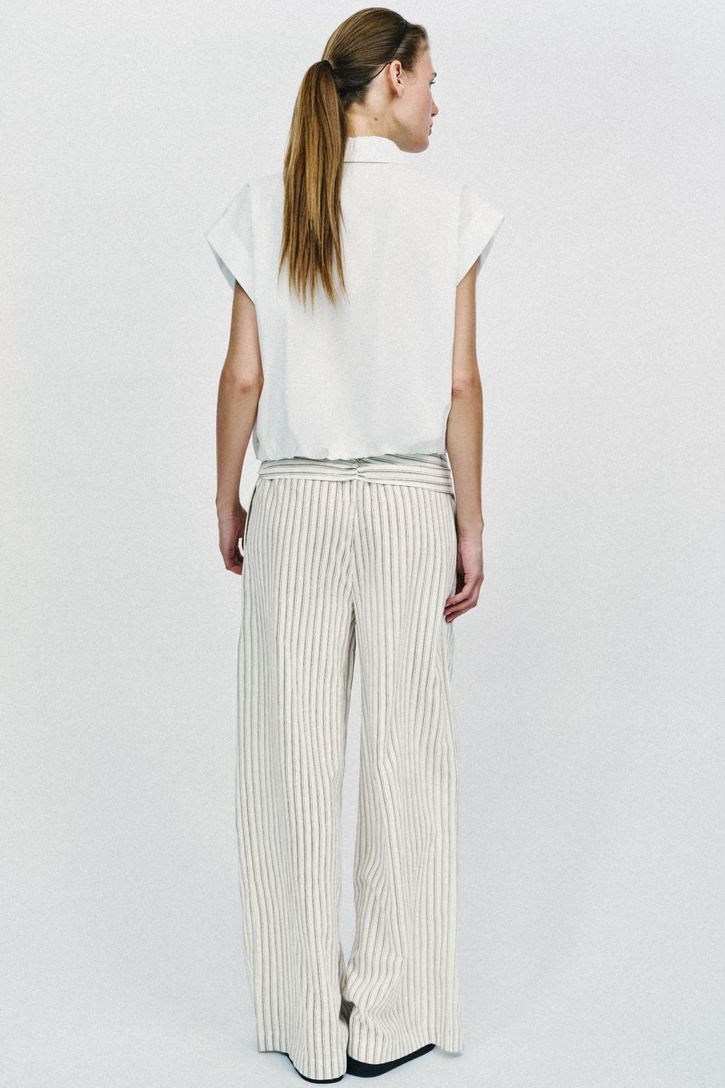 ШИРОКИЕ БРЮКИ В ПОЛОСКУ С ПЛАТКОМ