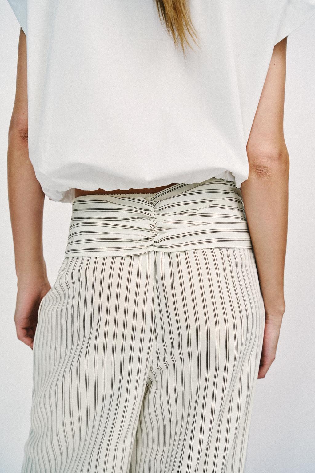 ШИРОКИЕ БРЮКИ В ПОЛОСКУ С ПЛАТКОМ