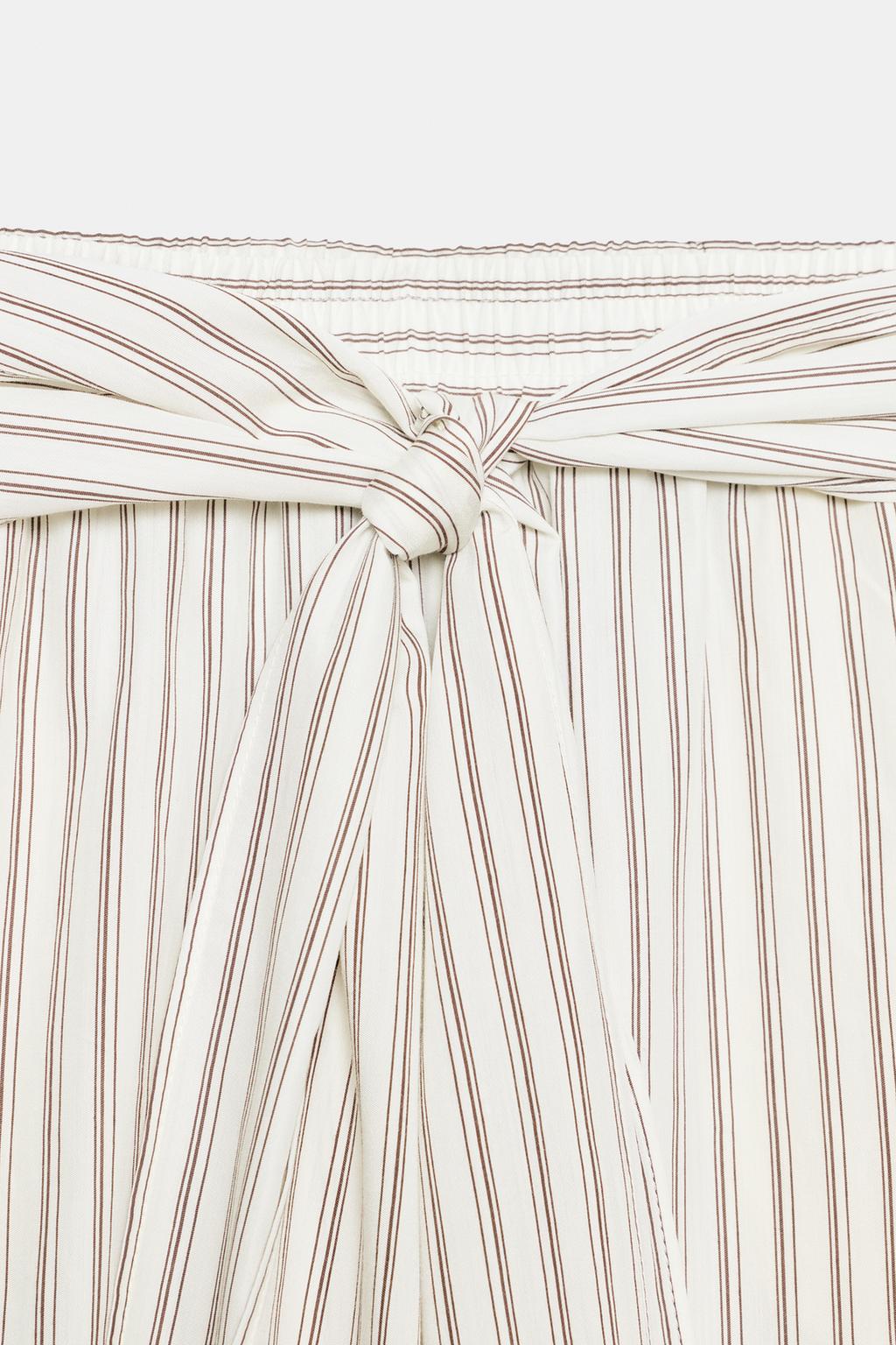 ШИРОКИЕ БРЮКИ В ПОЛОСКУ С ПЛАТКОМ