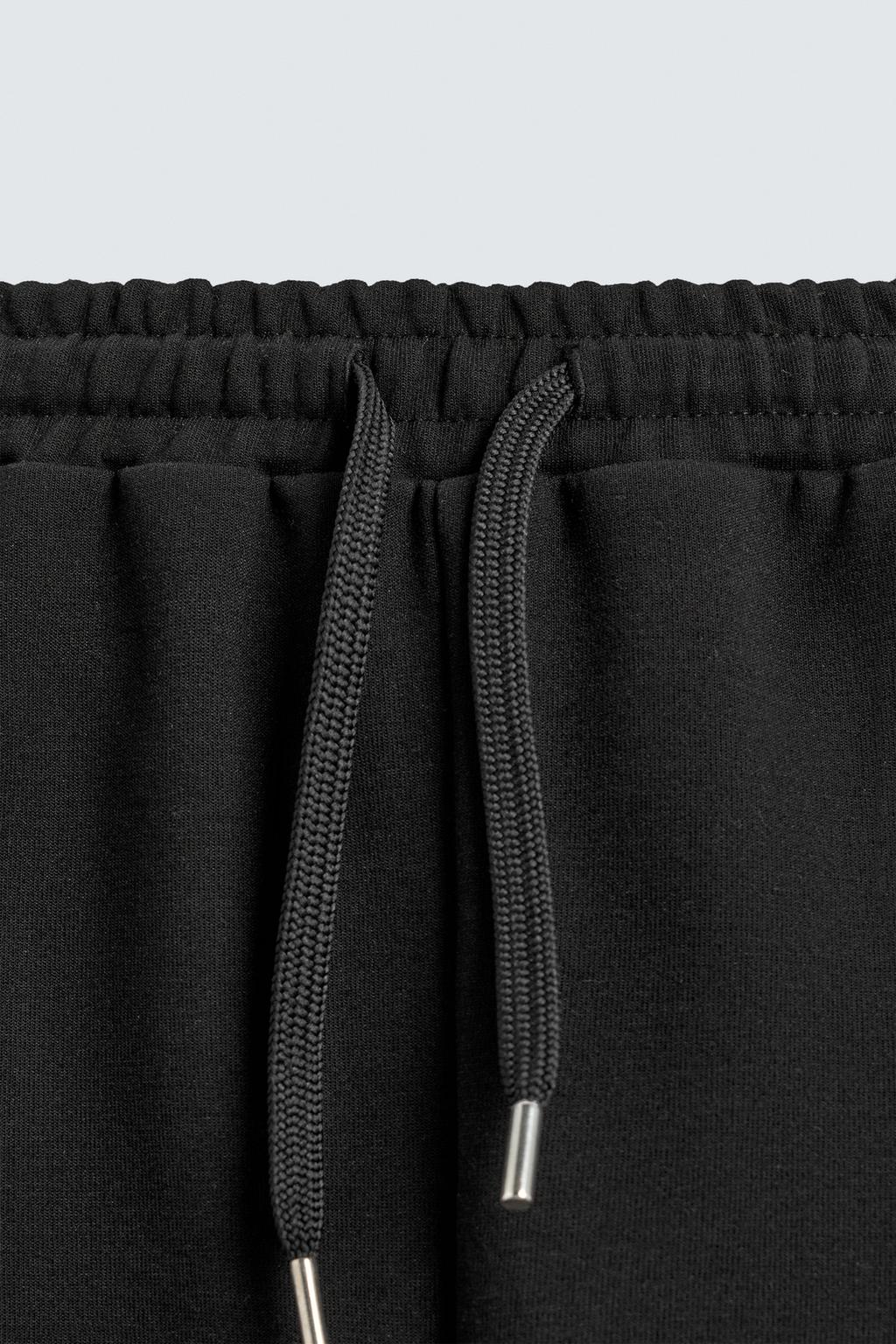 ШОРТЫ-ДЖОГГЕРЫ С ЭТИКЕТКОЙ