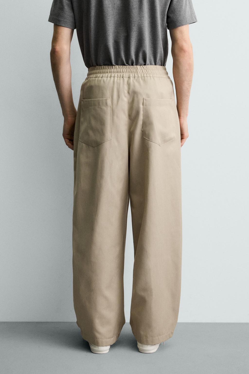 БРЮКИ BALLOON FIT С ЗАЩИПАМИ