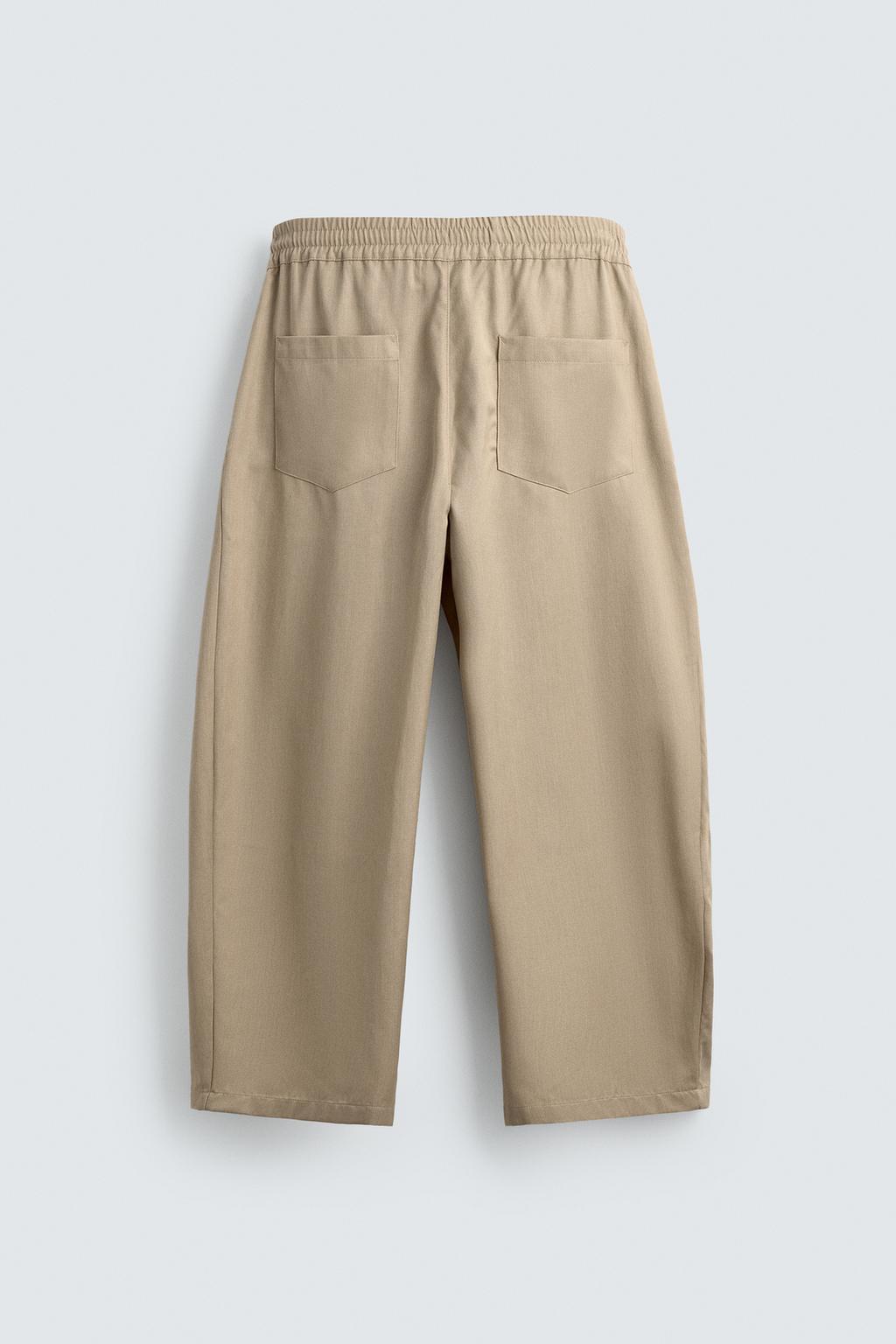 БРЮКИ BALLOON FIT С ЗАЩИПАМИ