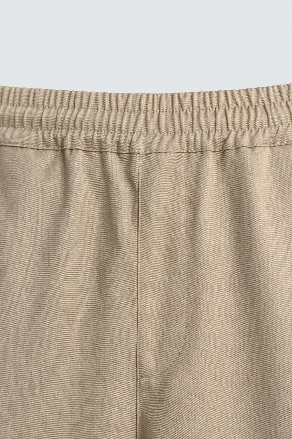 БРЮКИ BALLOON FIT С ЗАЩИПАМИ