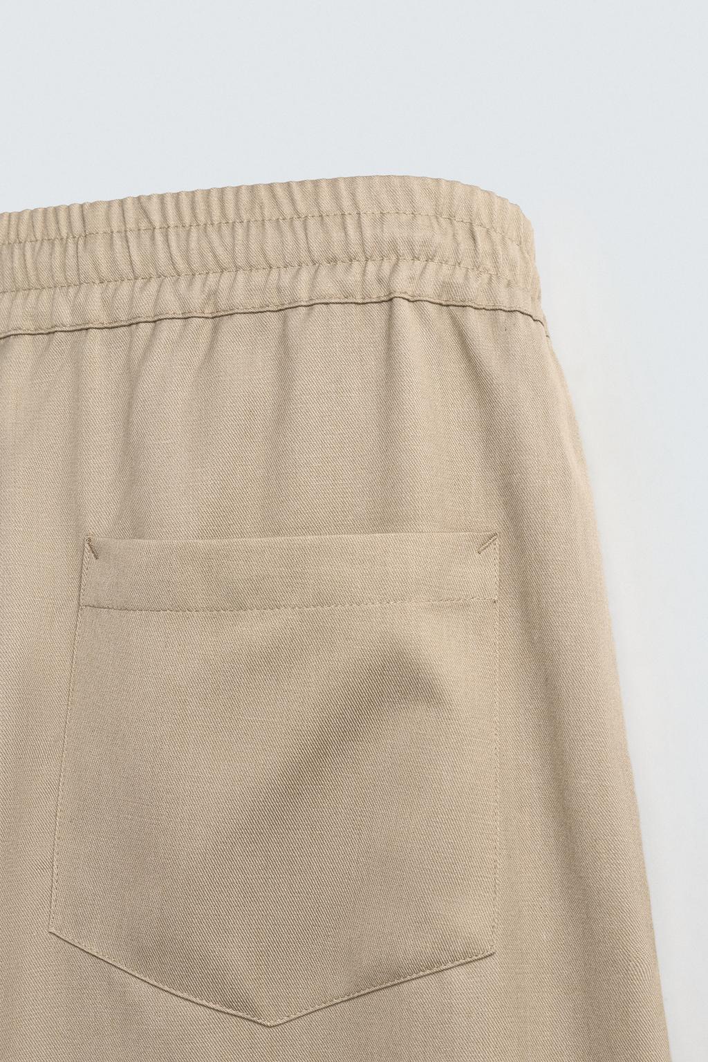 БРЮКИ BALLOON FIT С ЗАЩИПАМИ