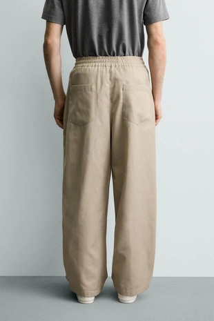 Брюки Balloon Fit с защипами