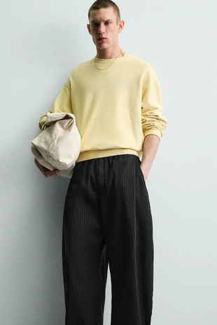 Брюки Balloon Fit с защипами- Заказать в России