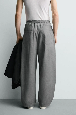 Брюки Balloon Fit с защипами- Заказать в России