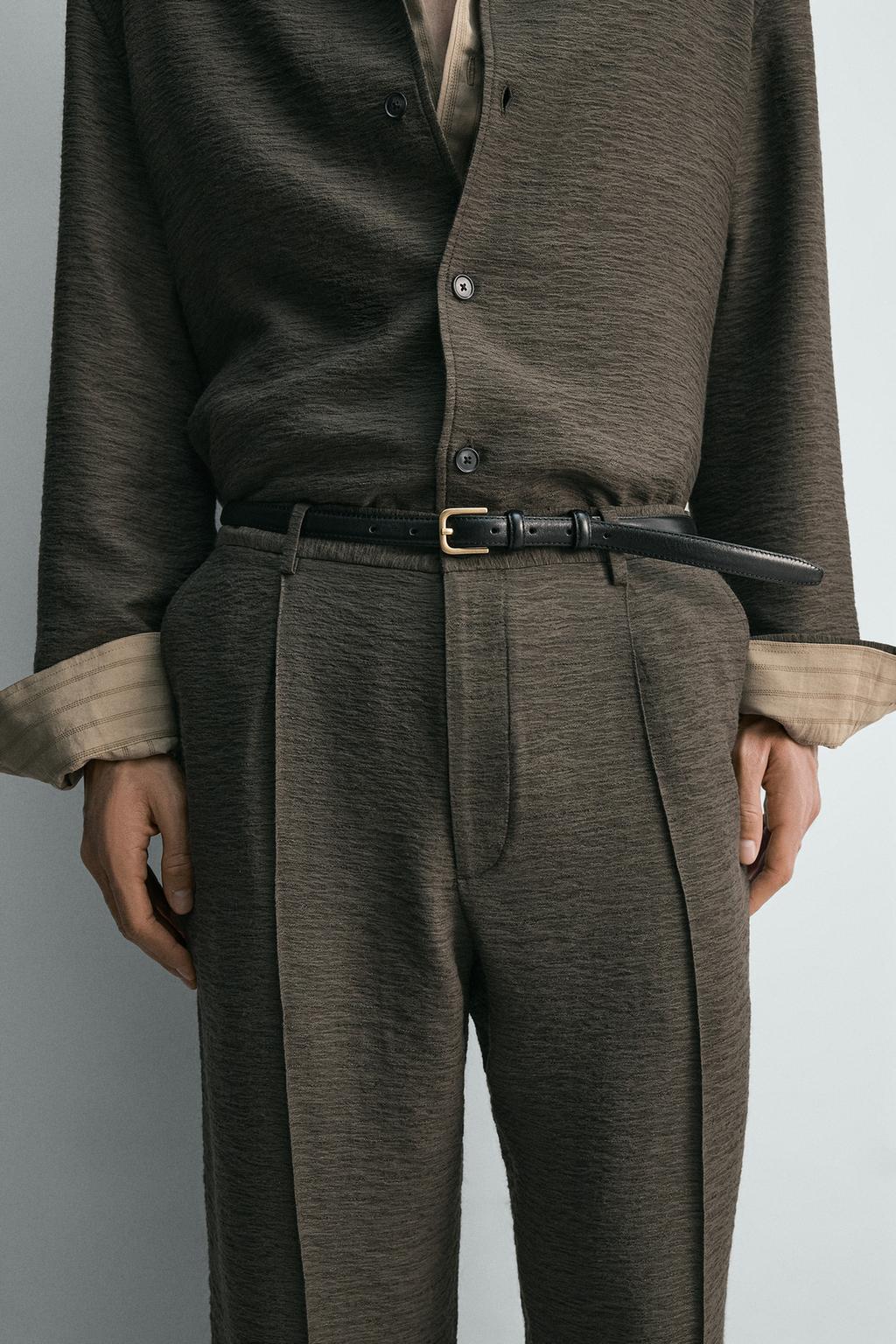 СТРУЯЩИЕСЯ БРЮКИ ИЗ РЕЛЬЕФНОЙ ТКАНИ СО СКЛАДКАМИ