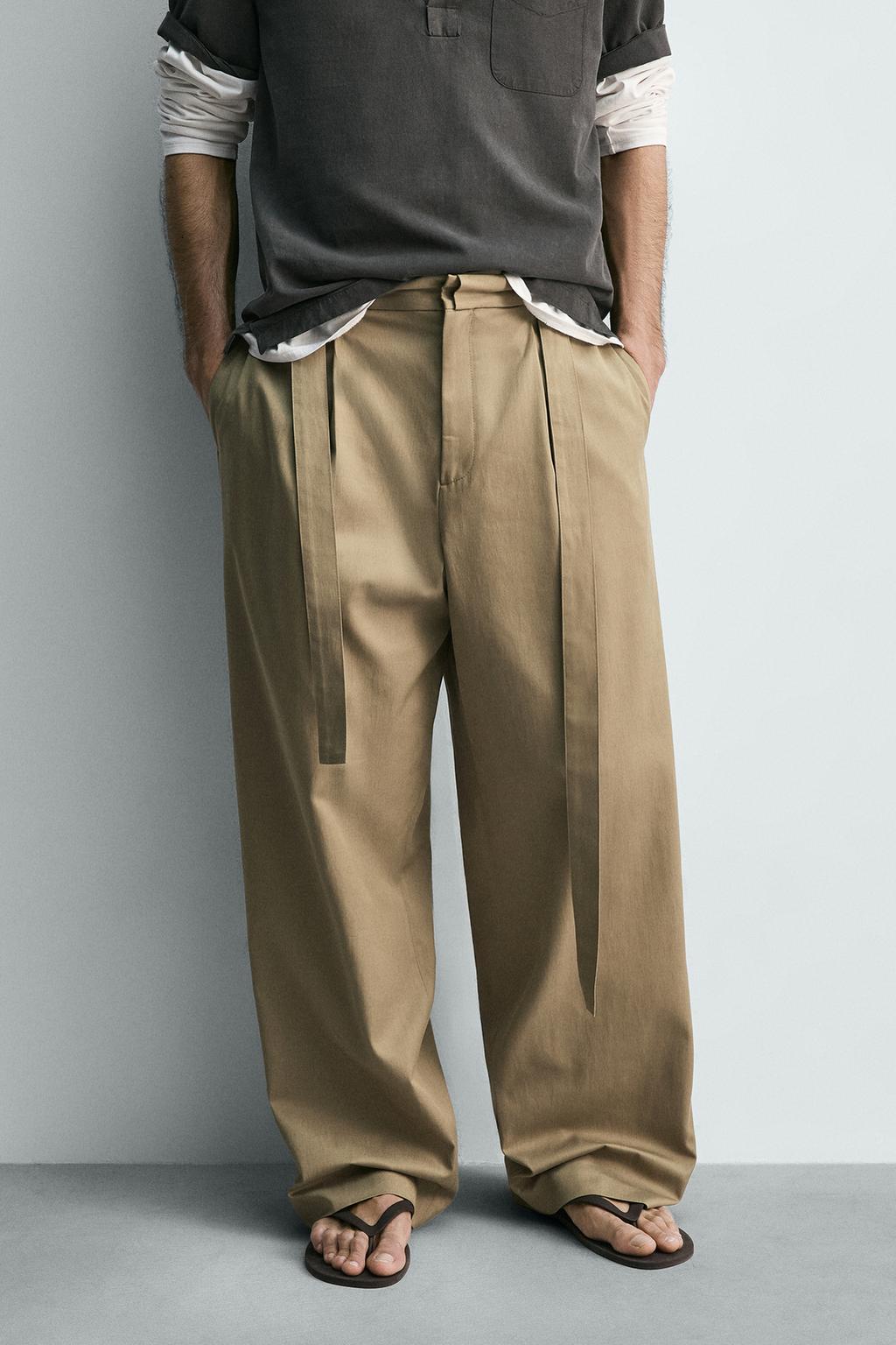 СВОБОДНЫЕ БРЮКИ С ЗАЩИПАМИ И РЕМНЕМ