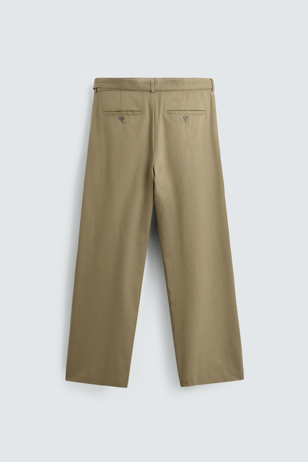 СВОБОДНЫЕ БРЮКИ С ЗАЩИПАМИ И РЕМНЕМ