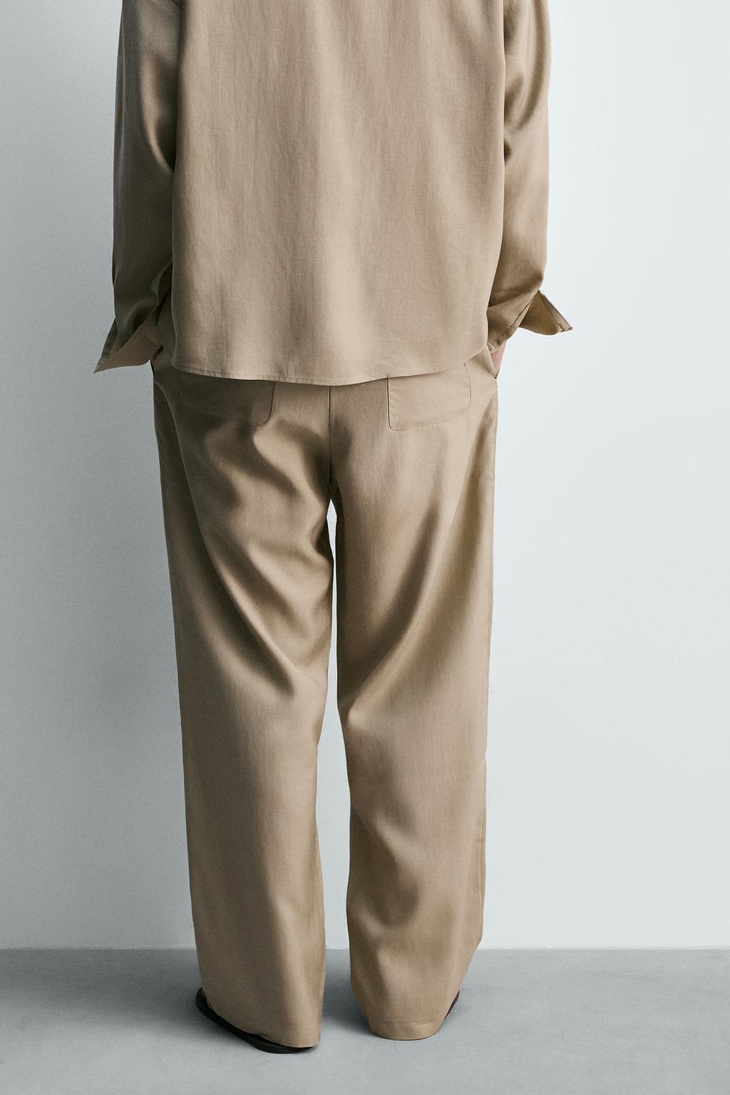 СТРУЯЩИЕСЯ БРЮКИ СО СКЛАДКАМИ