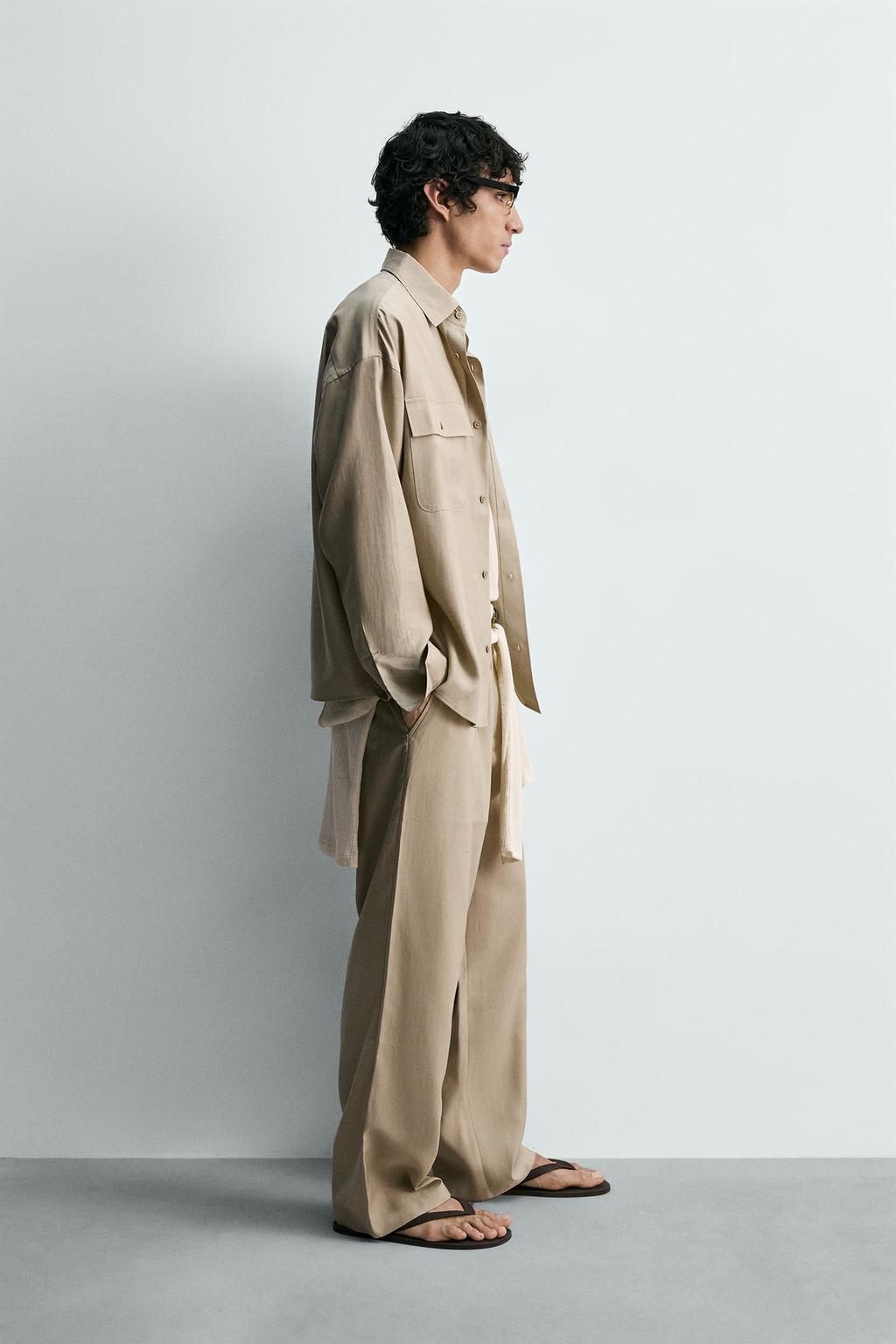 СТРУЯЩИЕСЯ БРЮКИ СО СКЛАДКАМИ