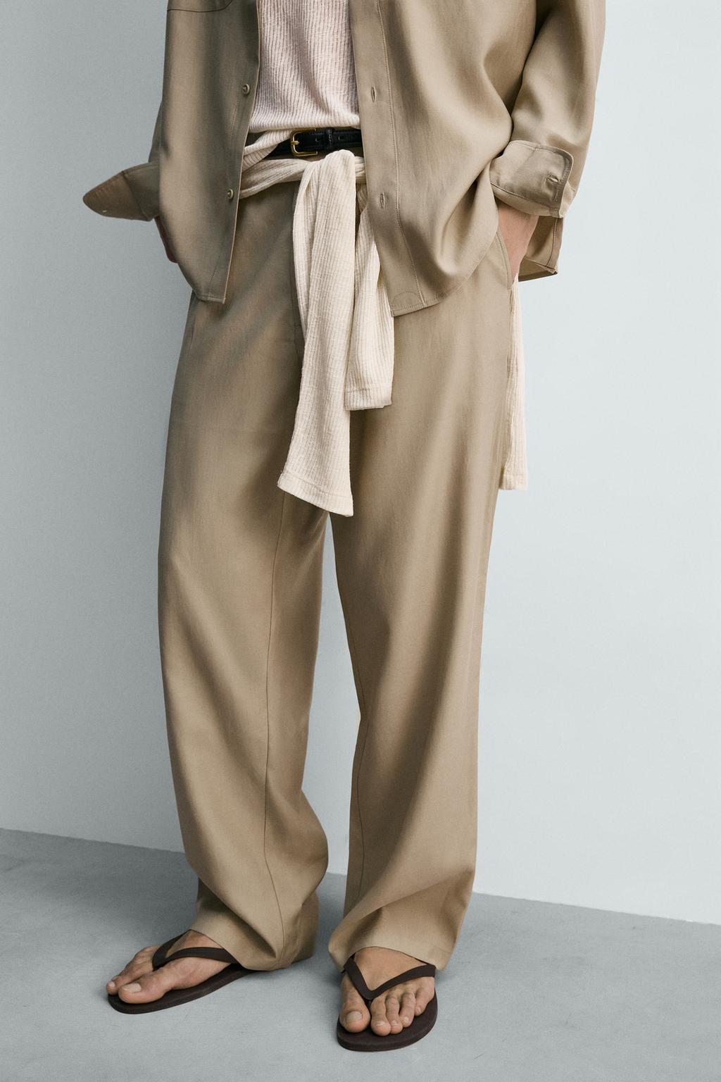 СТРУЯЩИЕСЯ БРЮКИ СО СКЛАДКАМИ