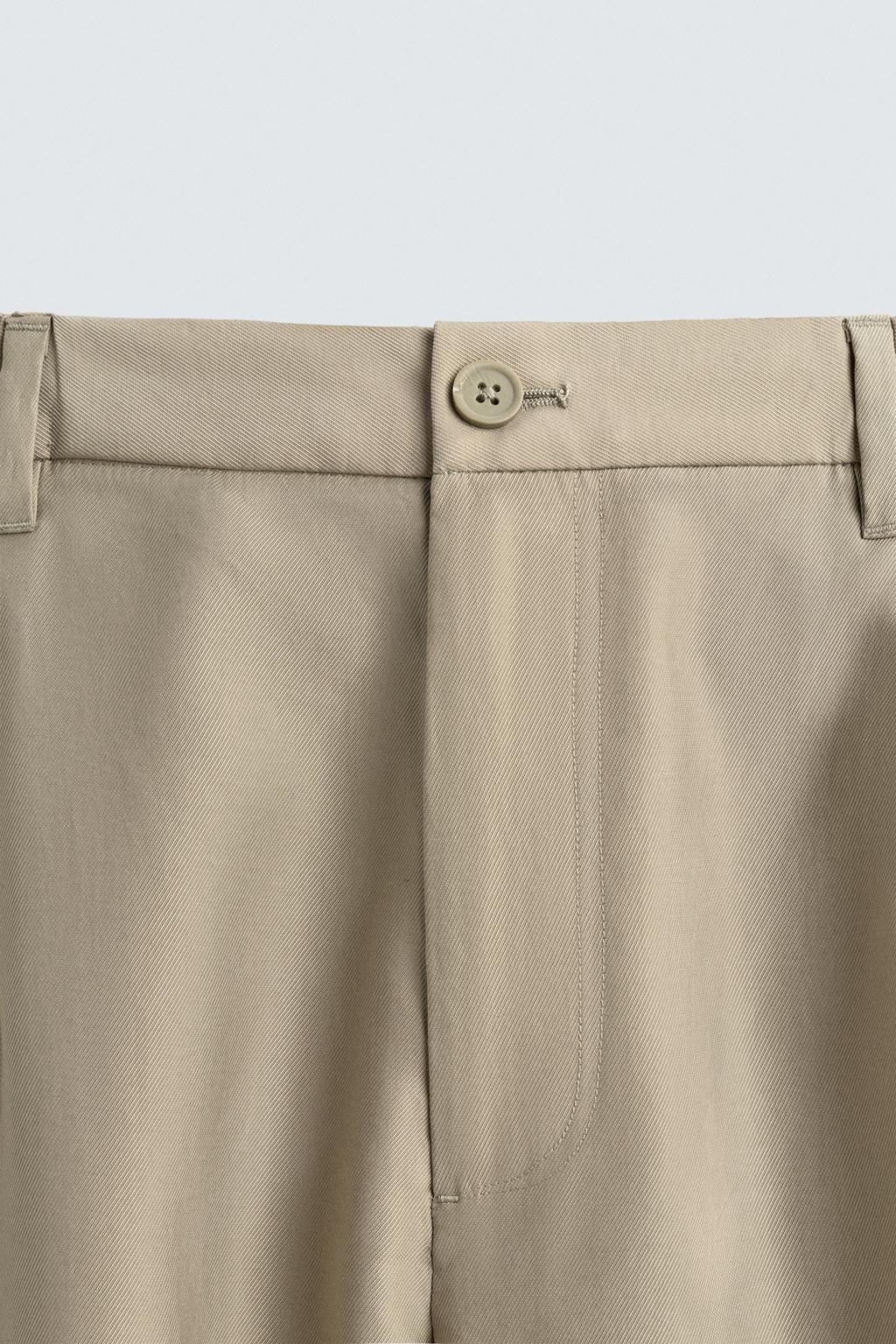 СТРУЯЩИЕСЯ БРЮКИ СО СКЛАДКАМИ