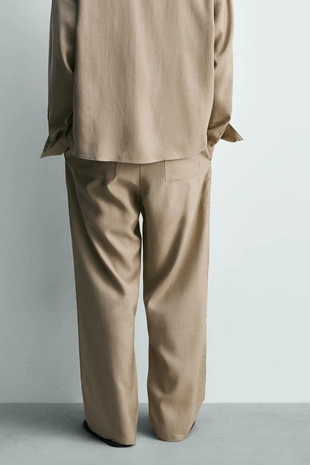 Струящиеся брюки со складками- Заказать в России