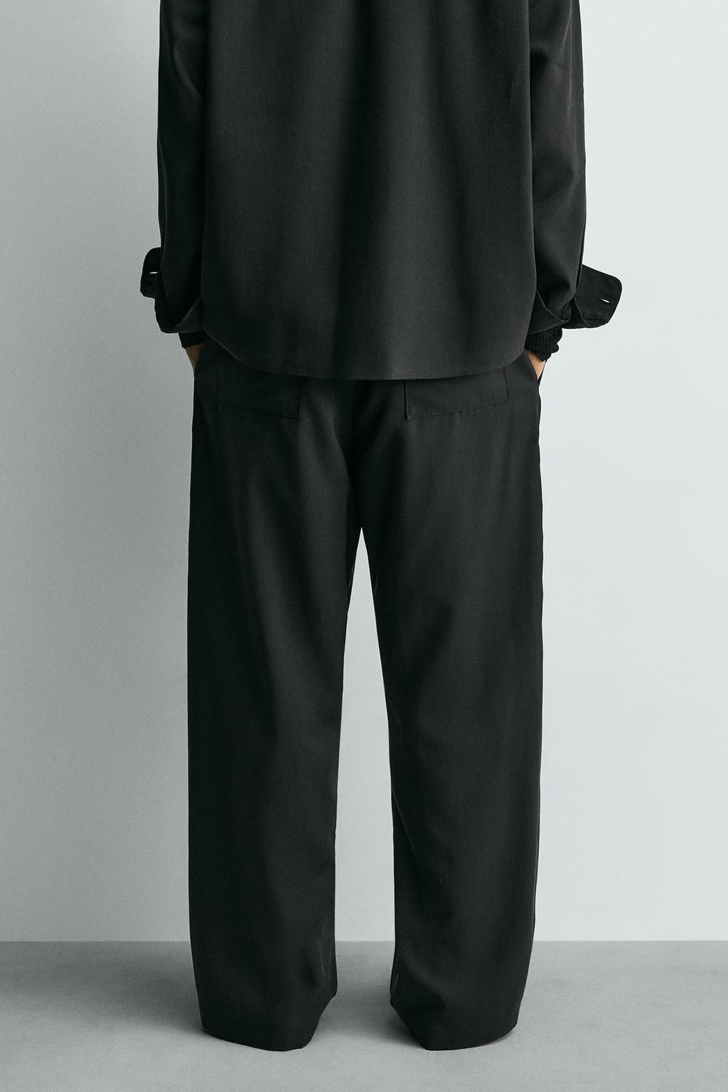 СТРУЯЩИЕСЯ БРЮКИ СО СКЛАДКАМИ