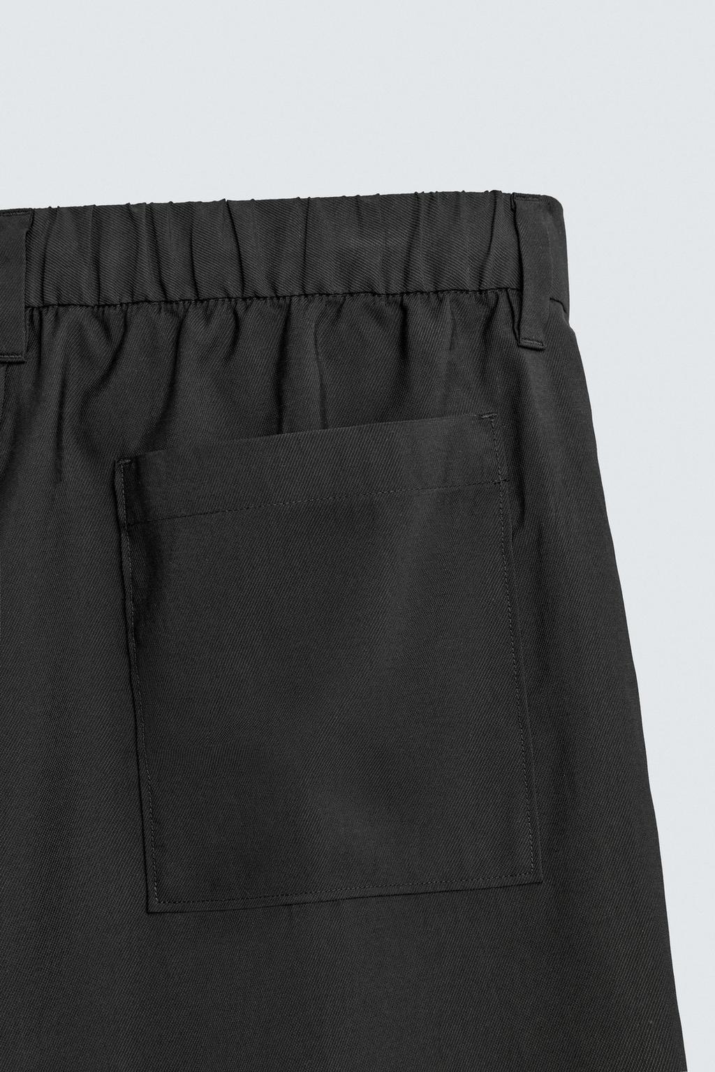 СТРУЯЩИЕСЯ БРЮКИ СО СКЛАДКАМИ